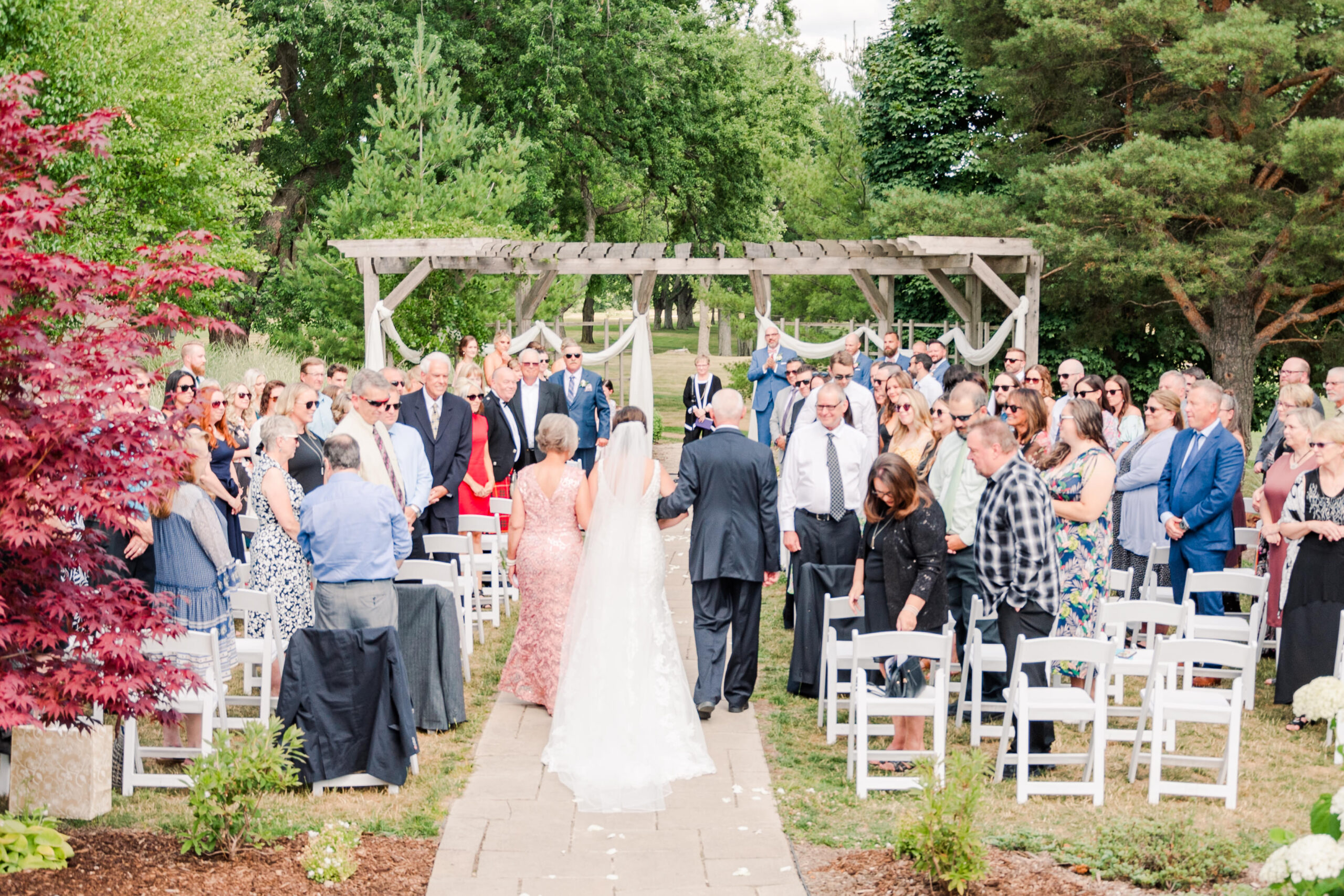 a wedding ceremony at stratford country club by life is beautiful photography. used in a blog post about showit websites